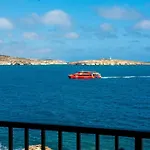 Islet Promenade Seafront 1 Bedroom With Sea View Balcony By Getawaysmalta